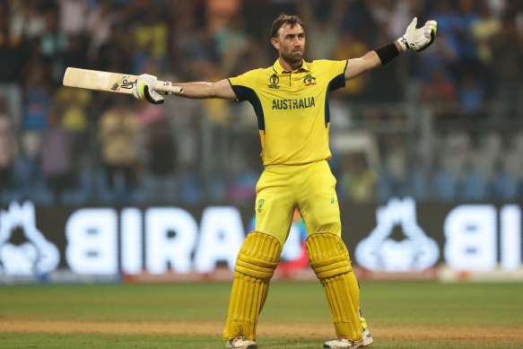 Glenn Maxwell celebrates hitting a six to bring up victory, a double century and a place in the semi-finals.
