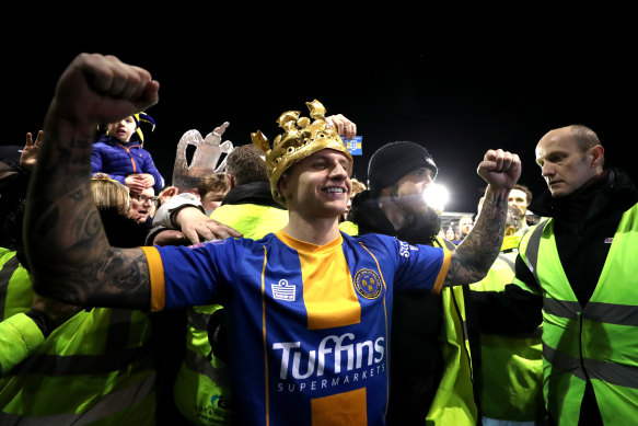 Jason Cummings celebrates after his two goals for Shrewsbury Town earned an FA Cup replay against Liverpool.