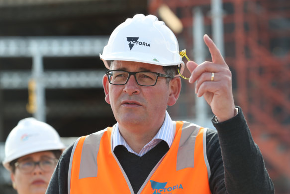 Premier Daniel Andrews is pictured at a separate press conference on Tuesday.