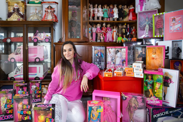 Chrystal Palmer with part of her Barbie collection.