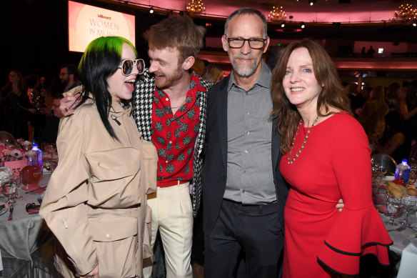 The siblings – Billie and Finneas – with parents Maggie Baird and Patrick O’Connell at Billboard Women in Music 2019. 
