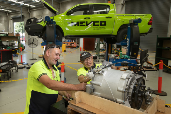 Garry Clerkes and Dzung Huynh, at SEA-Electric’s plant in Dandenong, where the company installs electric engines in utes and other commercial vehicles.  