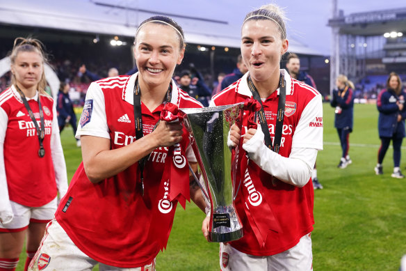 Caitlin Foord (left) and Steph Catley after their League Cup triumph with Arsenal in March.