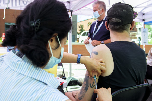 A man receives a monkeypox vaccine in Canada.