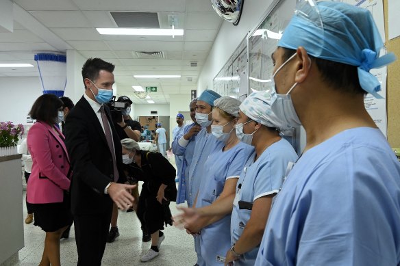 Premier Chris Minns chats with staff at Liverpool Hospital just days after the NSW election.