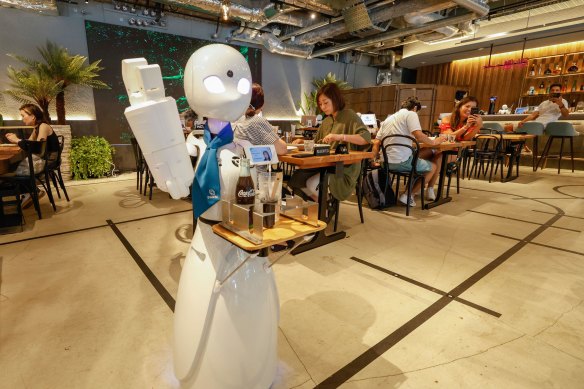 The robots at Tokyo’s DAWN Avatar Robot Cafe are controlled by people living with disabilities, operating them from home or in hospital.