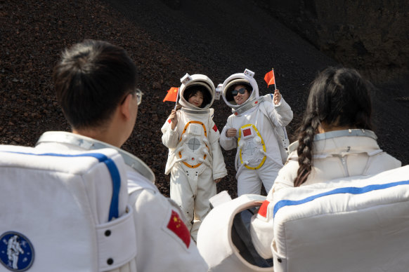 China’s patriotic tourists travel to watch the rocket launch in Hainan. 