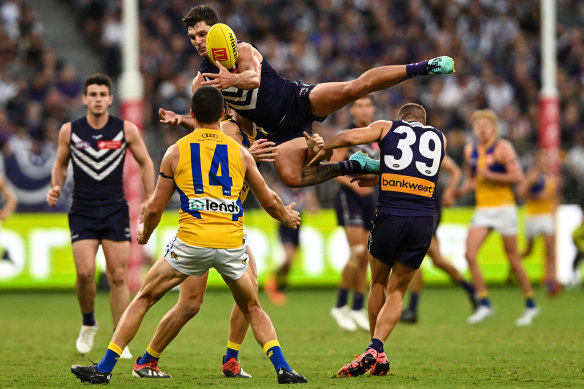 Lachie Schultz of the Dockers rises for a mark.