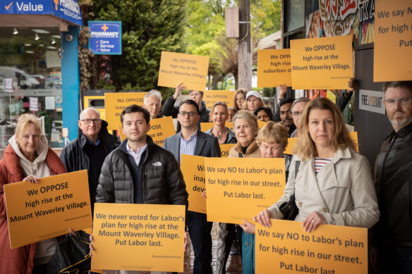 Asher Judah (centre) and supporters in Mount Waverley.