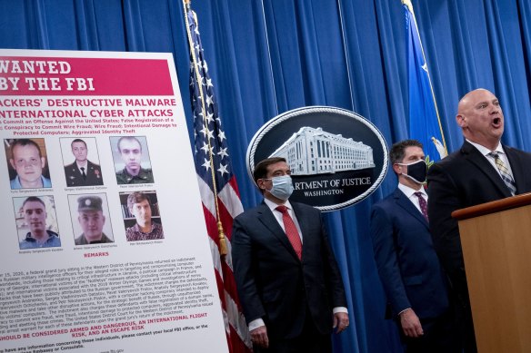 A poster showing six wanted Russian military intelligence officers is displayed in Washington in October.