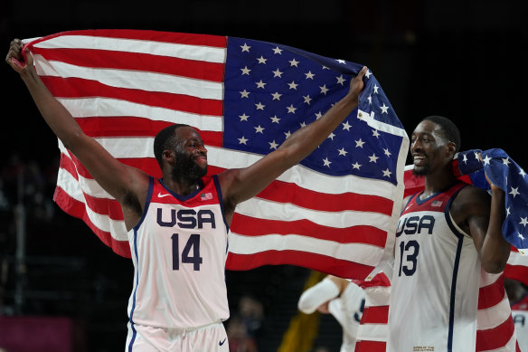The US’ Draymond Green (left) and Bam Adebayo celebrate winning gold.