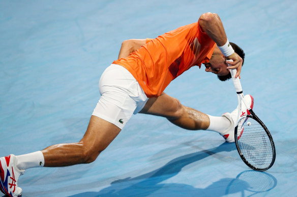 Djokovic took a medical timeout for a hamstring strain but looks strong against opponent Medvedev.