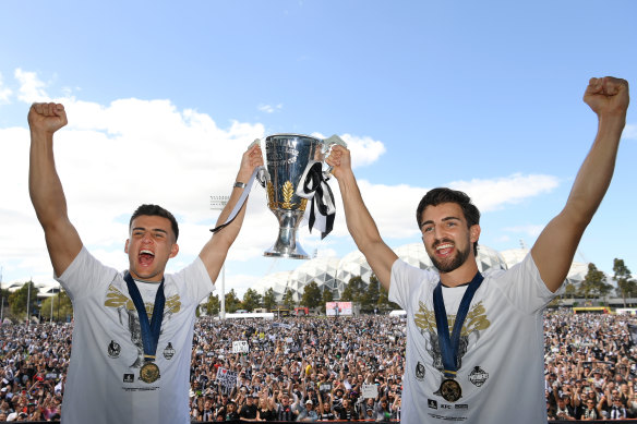 The Daicos boys, Nick and Josh, with the 2023 premiership cup.