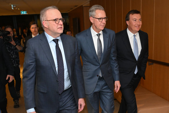 Prime Minister Anthony Albanese arrives at the Business Council of Australia Annual Dinner at the Hyatt Regency with BCA president Geoff Culbert (centre) and chief executive Bran Black.