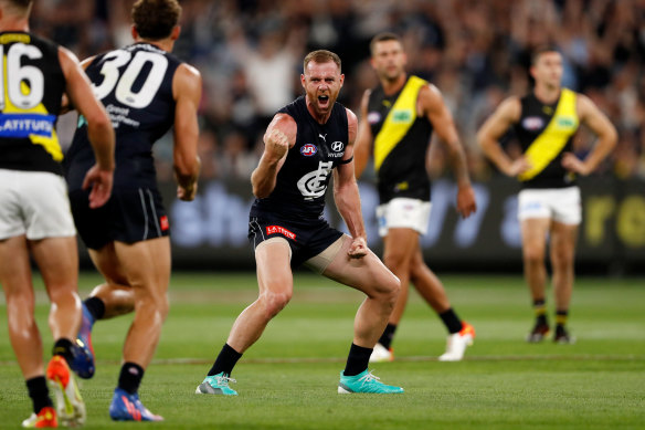 Sam Docherty celebrates a goal in his comeback match against the Tigers.