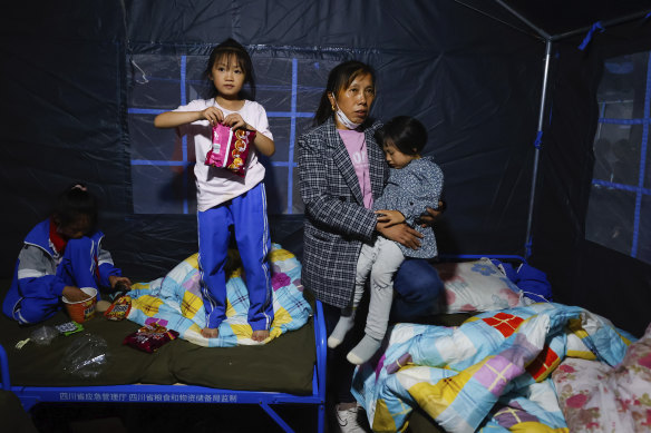 Residents shelter in temporary tents setup in the aftermath of the earthquake in southwestern China’s Sichuan Province.