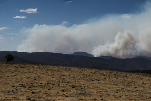 The Peaks and Green Wattle Creek fires in the Warragamba catchment, as seen from High Range on Sunday.