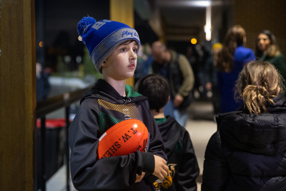 Liam Tomlinson, 10, watches the game on Friday night.