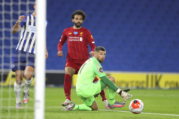 Brighton's Mathew Ryan watches as a shot from Liverpool's Mohamed Salah goes wide last season.