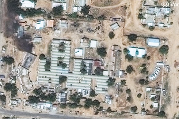 A satellite image taken on November 6 shows smoke from a fire lit at the Saudi Hospital in El-Fasher.