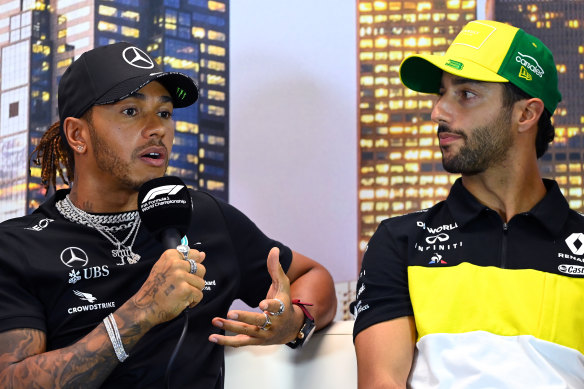 Lewis Hamilton, left, and Daniel Ricciardo, right, at a press conference in Melbourne.