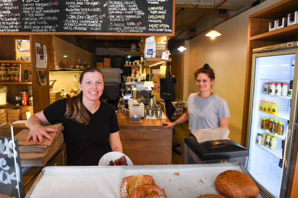 Bourke Street Bakery staff Kimberley Reed and manager Trina Bryan wait for lunch time customers in North Sydney.