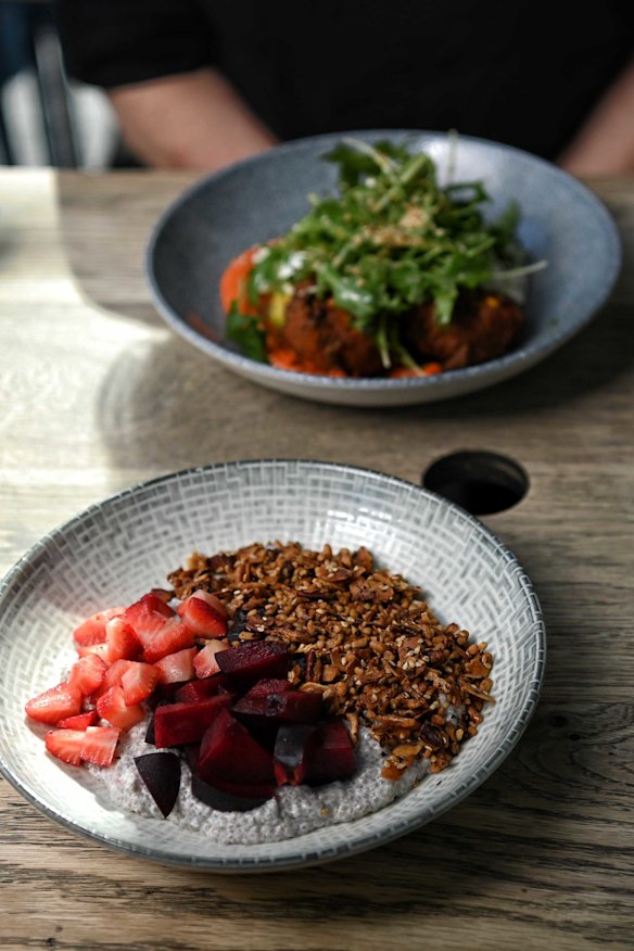  Zucchini and corn fritters, served with romesco, tahini yogurt, avocado and soft eggs, chia with coconut yogurt, served with red plums and strawberries and house granola.