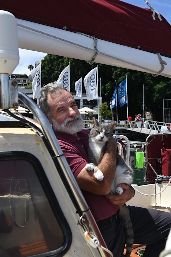 Bob Williams with his cat Oli on board Sylph VI.
