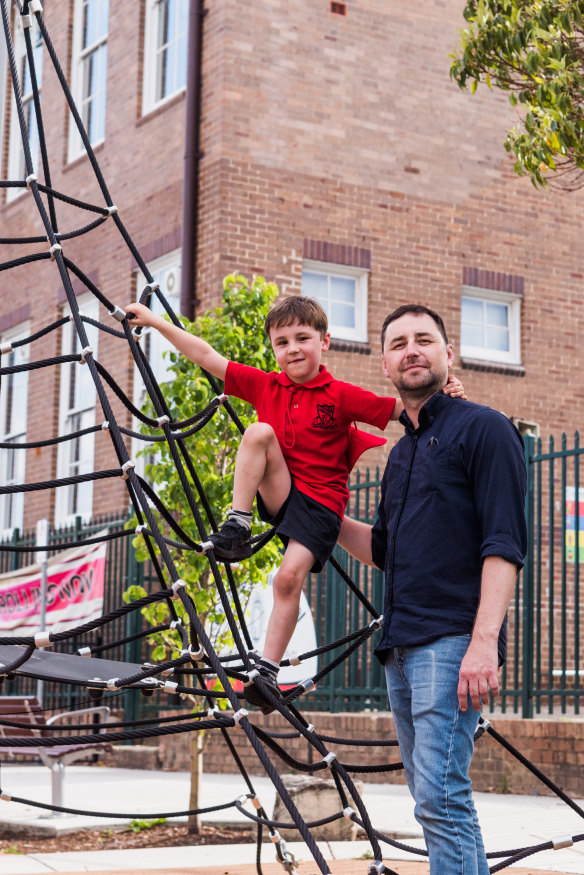 Colin Cosier, pictured with his son, is concerned about the proposed development shadowing Campsie Public School. “I’m all for revitalisation. But is it truly being done in the interests of the community, with the community, and for the community? I think not.”