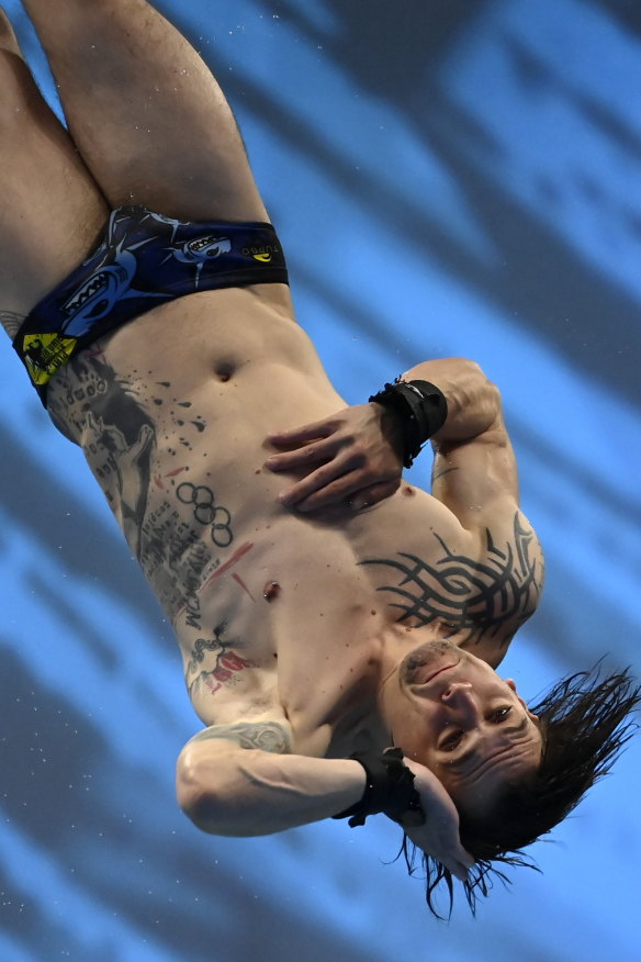 French men’s diving champion Matthieu Rosset is appropriately dressed for French pools where shorts-style bathers are banned. 