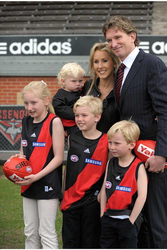 James Hird and wife Tania with their children, including Tom (centre) in 2010, when James was appointed coach of Essendon.