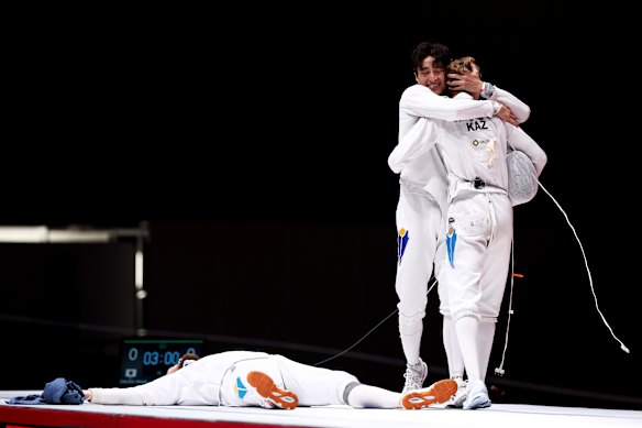 Vadim Sharlaimov, Yerlik Sertay and Kirill Prokhodov of Kazakhstan celebrate after defeating South Korea to win gold in the Fencing Men’s Epee Team Finals on day eight of the 20th Asian Games Aichi-Nagoya at Aichi Sky Expo on September 27, 2026 in Tokoname, Aichi, Japan.