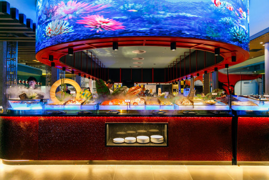 A huge curved screen above the buffet projects an undulating underwater seascape into the 220-seater diner.