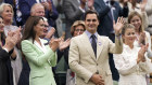Roger Federer, in the Royal Box next to Britain’s Kate Princess of Wales, is applauded at Centre Court.