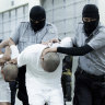 The US deportees are marched into the Terrorism Confinement Centre in Tecoluca. The crown jewel of El Salvador’s aggressive anti-crime strategy is a mega-prison where visitation, recreation and education are not allowed.