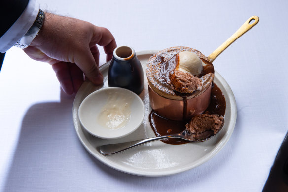 Grossi Florentino’s souffle is finished with sauce and ice-cream by the diner, which is part of its popularity.