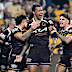 Xavier Willison of the Broncos celebrates after scoring a try.