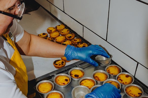Baked@Bina’s owner-baker Sabrina Dias hand-shapes each Portuguese tart.