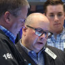 ASX ends week on a high note; tech slide hits Wall Street