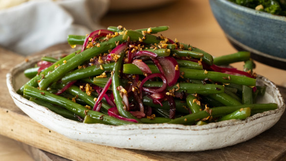 Green bean salad with sizzled cumin garlic dressing.