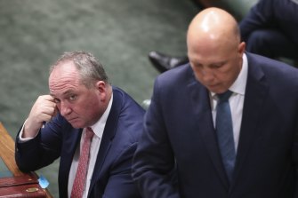 The Leader of the House, Peter Dutton (right), sought to toss Barnaby Joyce a lifebuoy by demanding the Nationals’ motion be ruled out of order.