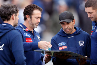 Testing: Geelong’s coaches turn to the board.