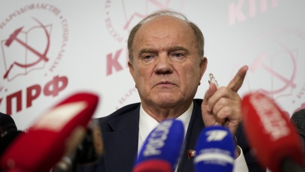 Russian Communist Party leader Gennady Zyuganov gestures at his news conference on Sunday.