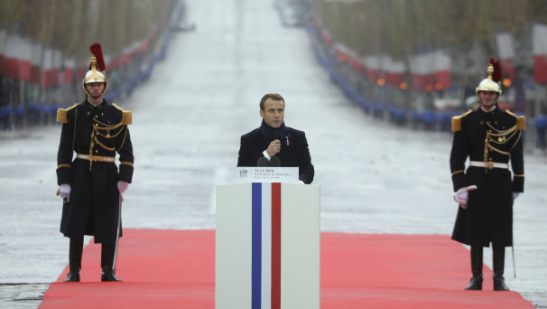 French President Emmanuel Macron delivers his Remembrance Day speech in the shadow of the Arc de Triomphe in  Paris on Sunday.