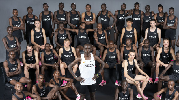 Eliud Kipchoge poses with the pacemakers that will aid his attempt.