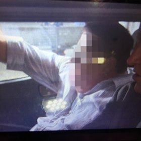 The accused in police custody. 