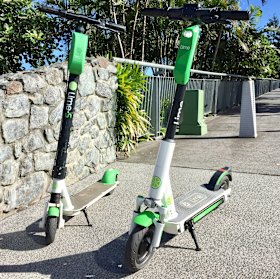 The new third-generation Lime scooter (right) alongside the generation 2 around Brisbane at present.