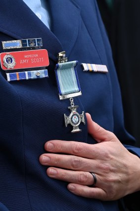 Scott with her Valour Award medal.