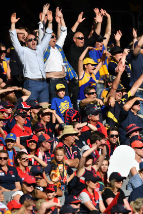 West Coast fans celebrate their thumping of Melbourne in the 2018 preliminary final. Trent Rivers was an Eagles fan then.