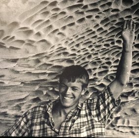 A young Jan Utzon in his father's favourite cave at Palm Beach.
